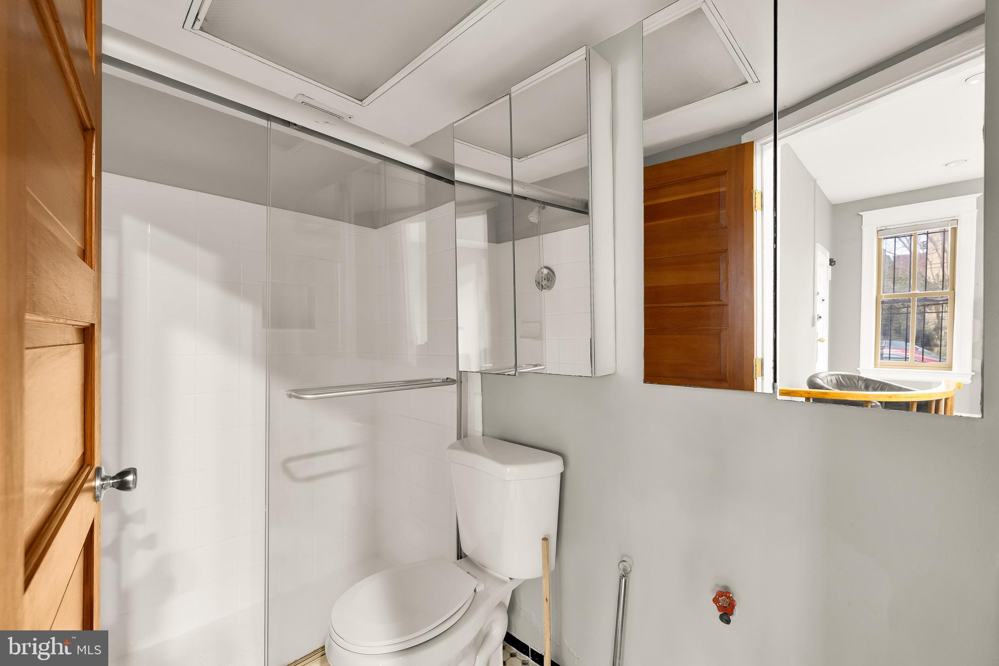 500 9th Street Southeast Washington, DC 20003 - Photo 12 of 34 a bathroom with a toilet and a shower