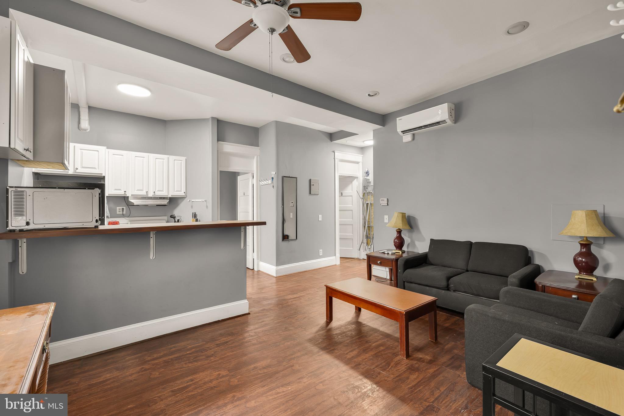 500 9th Street Southeast Washington, DC 20003 - Photo 13 of 34 a living room with furniture and a wooden floor