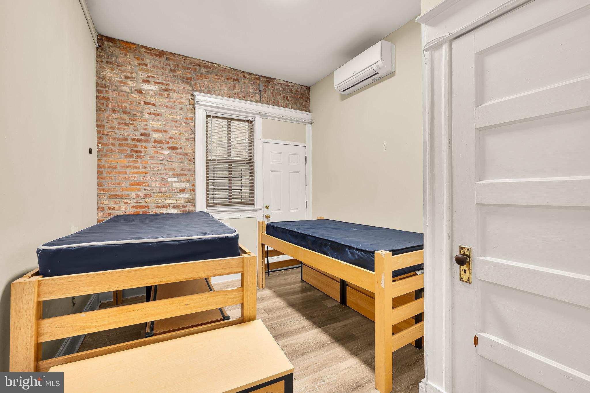 500 9th Street Southeast Washington, DC 20003 - Photo 20 of 34 a room with a bed and a window