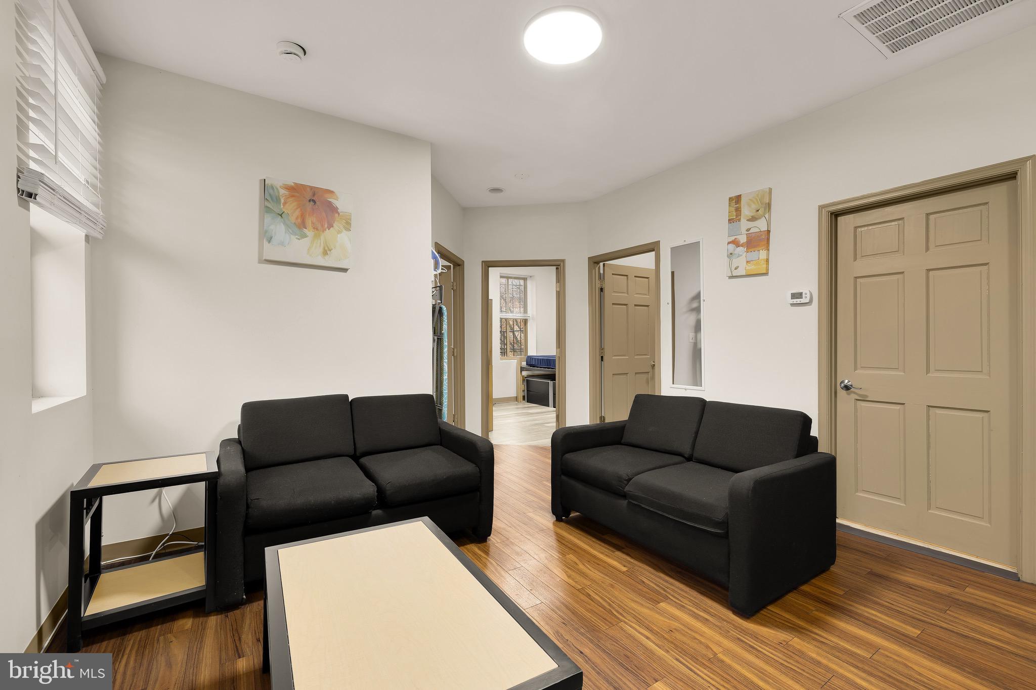 500 9th Street Southeast Washington, DC 20003 - Photo 22 of 34 a living room with furniture and a window