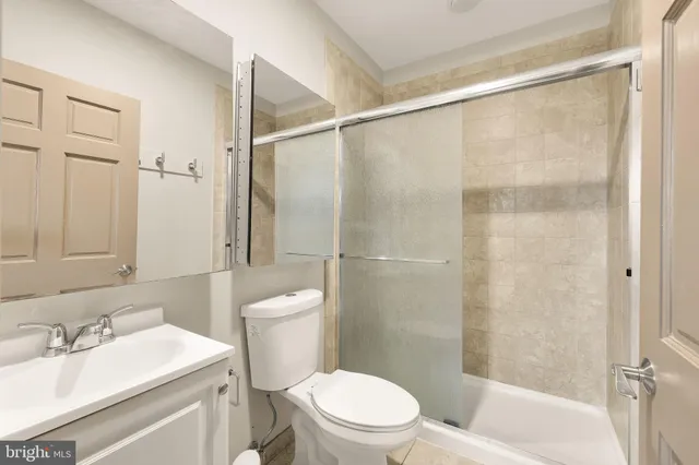 a bedroom with a bunk bed and a dresser