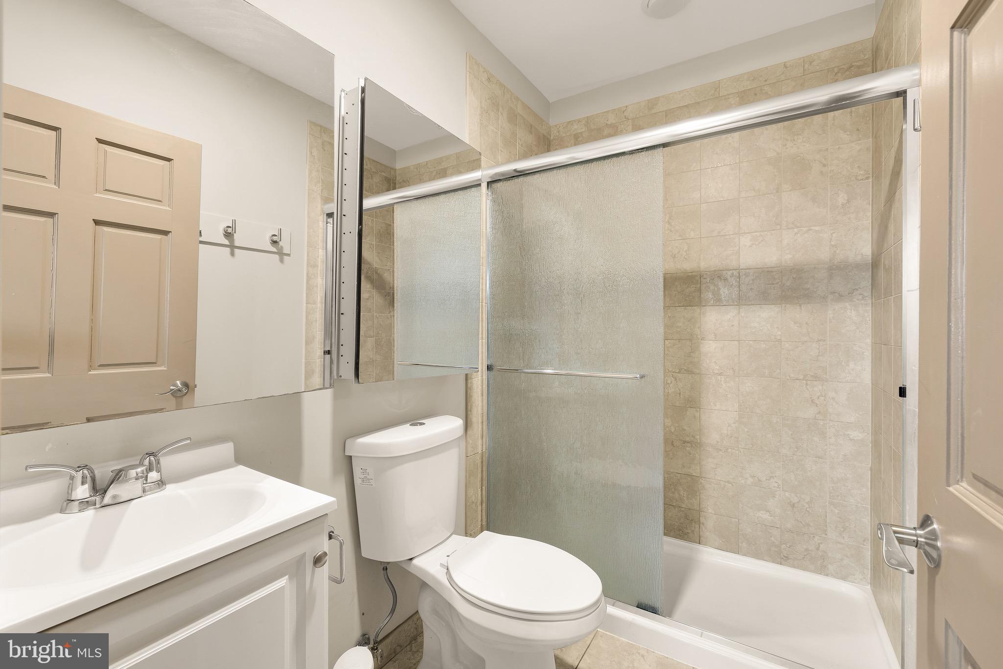 500 9th Street Southeast Washington, DC 20003 - Photo 31 of 34 a bathroom with a sink toilet and shower