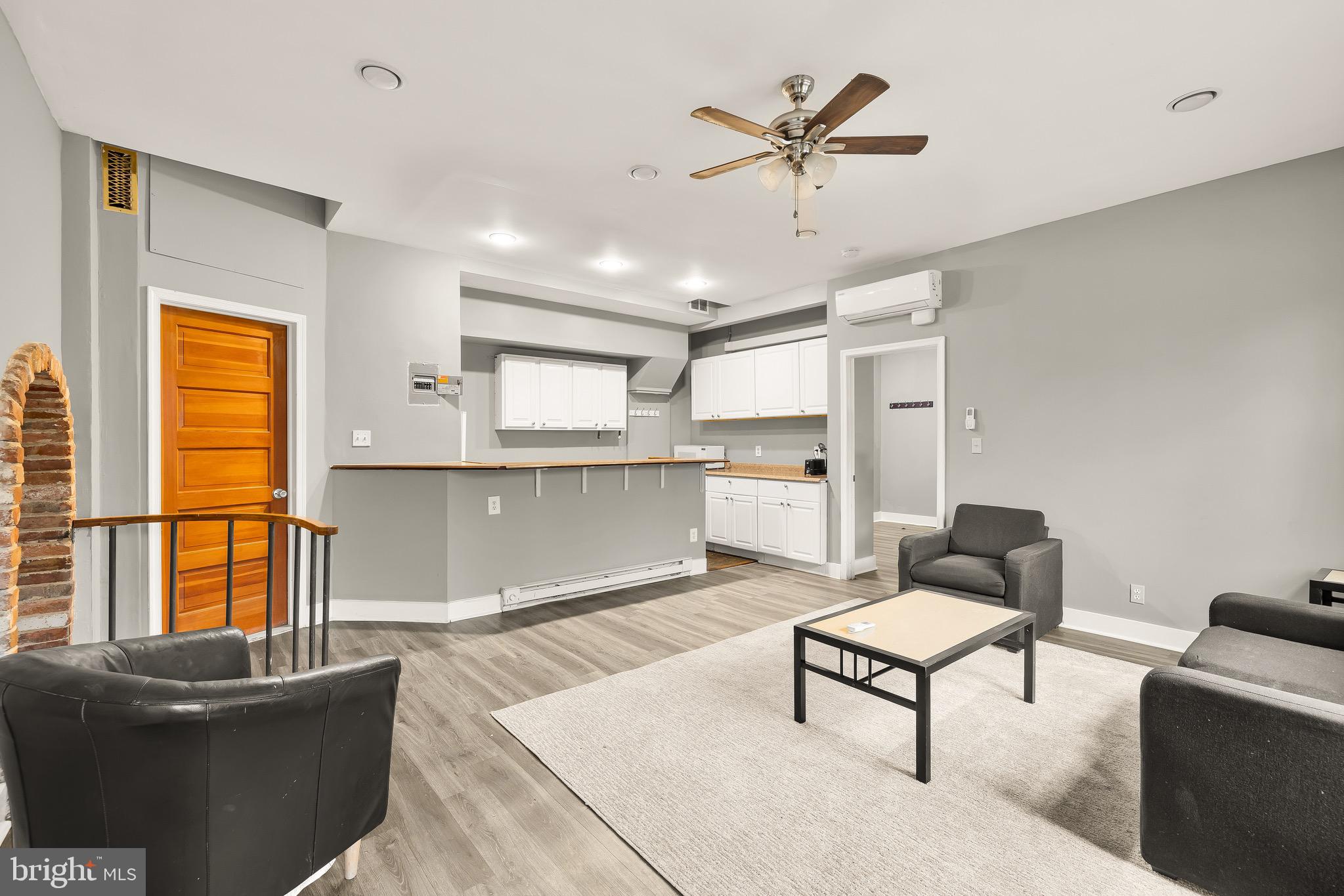500 9th Street Southeast Washington, DC 20003 - Photo 7 of 34 a living room with furniture and a window