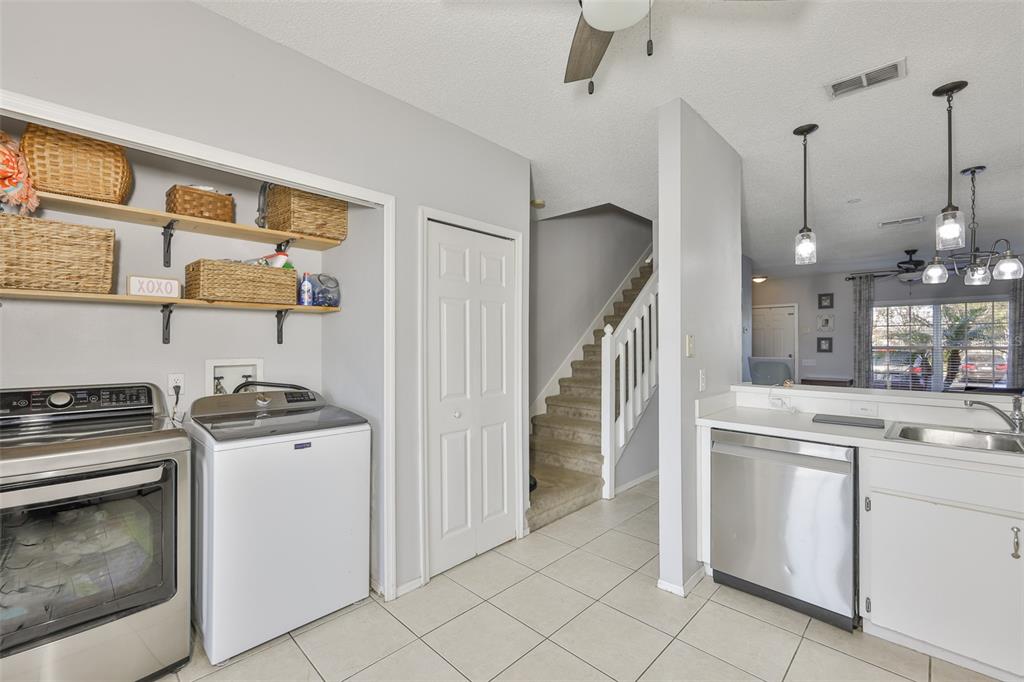 477 Countryside Key Boulevard Oldsmar, FL 34677 - Photo 17 of 46 a kitchen with cabinets and appliances