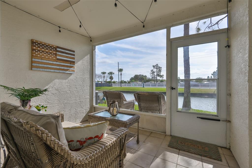 477 Countryside Key Boulevard Oldsmar, FL 34677 - Photo 18 of 46 a living room with furniture and a window