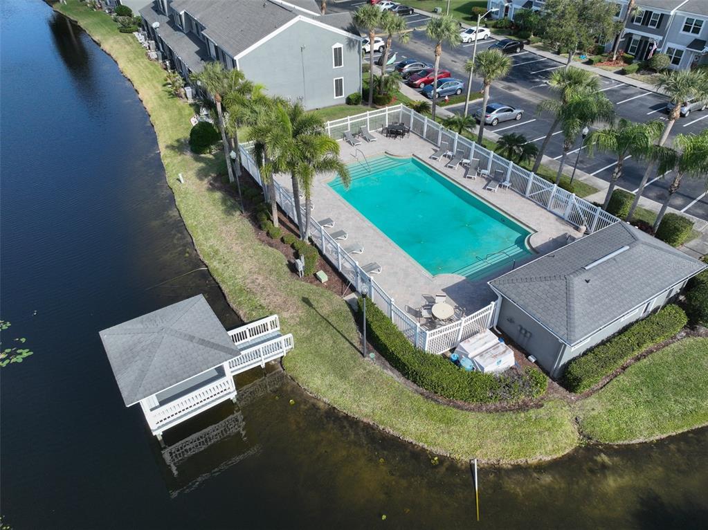 477 Countryside Key Boulevard Oldsmar, FL 34677 - Photo 35 of 46 an aerial view of a house with a yard and lake view