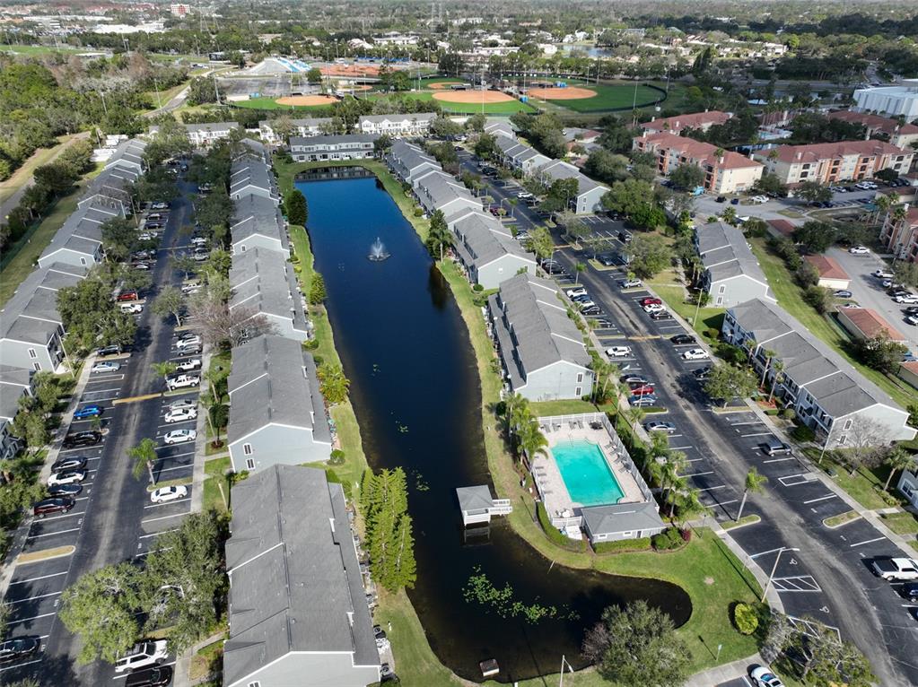 477 Countryside Key Boulevard Oldsmar, FL 34677 - Photo 36 of 46 an aerial view of residential houses with outdoor space