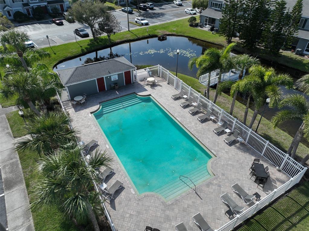 477 Countryside Key Boulevard Oldsmar, FL 34677 - Photo 42 of 46 an aerial view of a house with a garden and swimming pool
