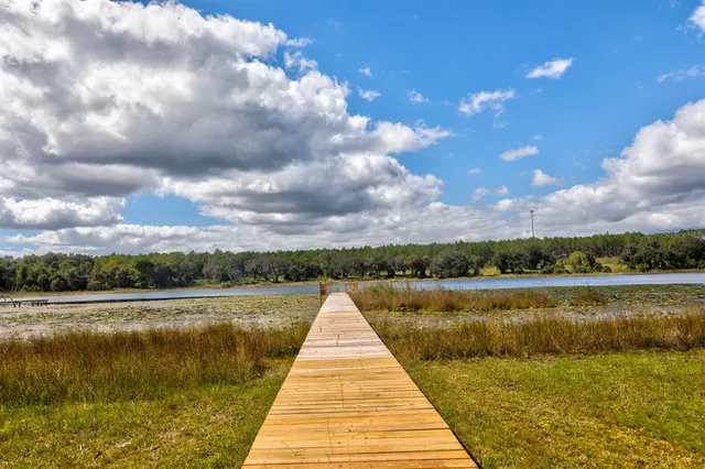 a view of outside space swimming pool and lake