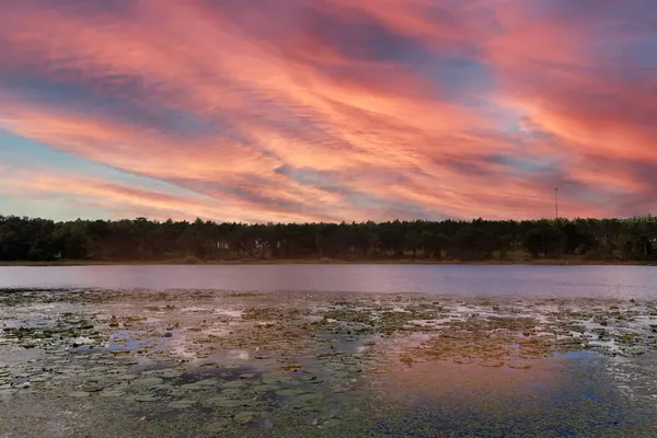 a view of an ocean and mountain