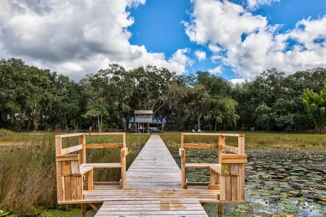 a view of a swimming pool with an outdoor space