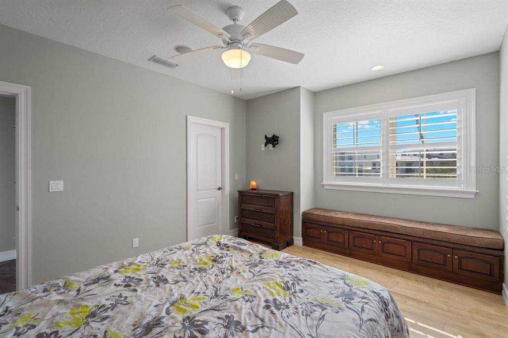 2 Mar Azul North Ponce Inlet, FL 32127 - Photo 42 of 98 a bedroom with a bed and a dresser