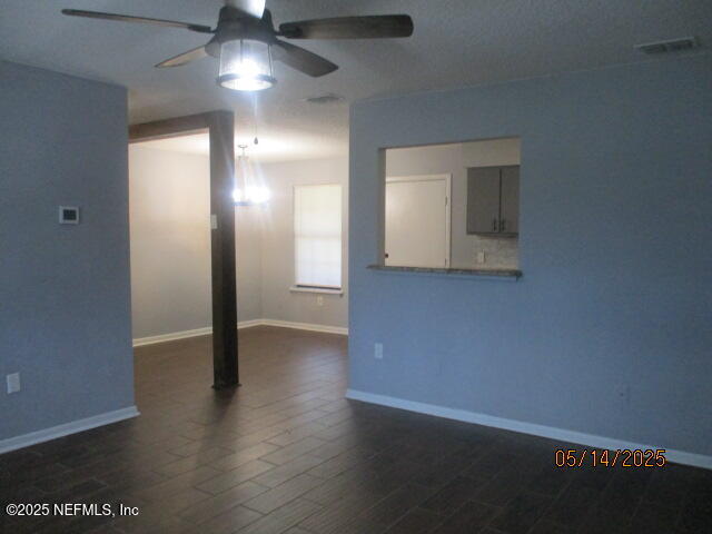 716 Shortputt Drive Macclenny, FL 32063 - Photo 12 of 24 a view of an empty room with wooden floor
