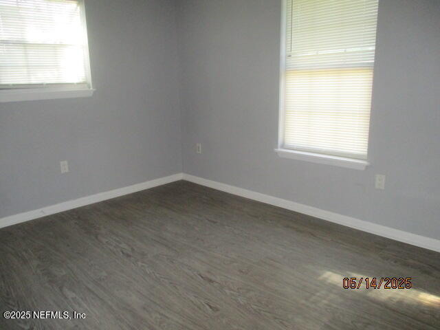 716 Shortputt Drive Macclenny, FL 32063 - Photo 18 of 24 an empty room with a window