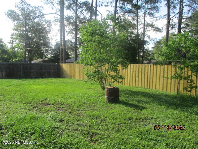 716 Shortputt Drive Macclenny, FL 32063 - Photo 22 of 24 a view of a backyard