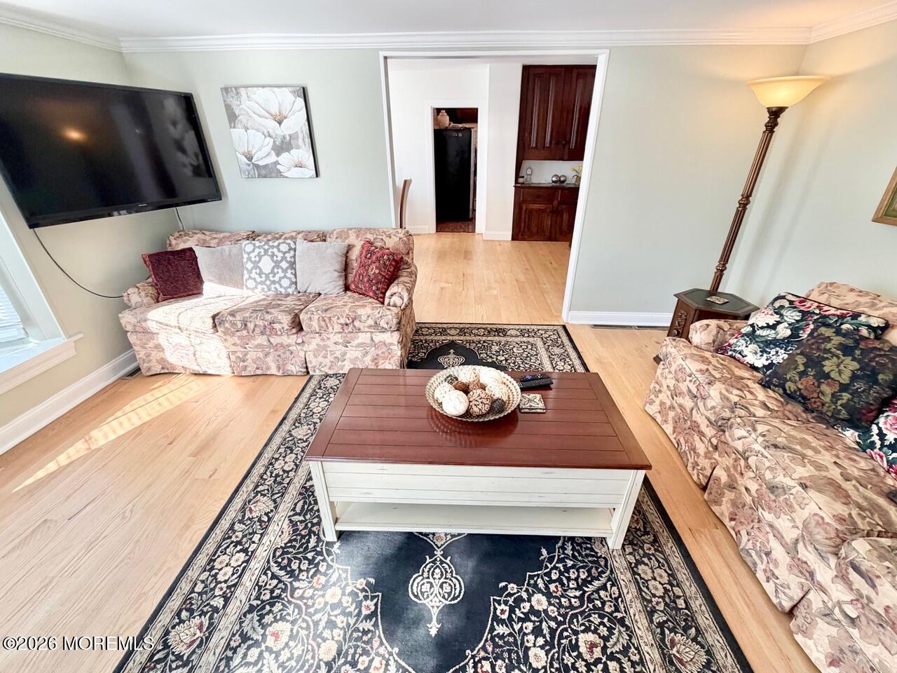 623 Main Street Leesburg, NJ 08327 - Photo 19 of 68 a living room with furniture and flat screen tv