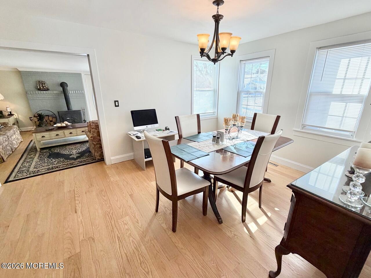 623 Main Street Leesburg, NJ 08327 - Photo 27 of 68 a view of a dining room with furniture window and wooden floor