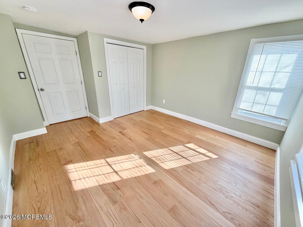 623 Main Street Leesburg, NJ 08327 - Photo 56 of 68 a view of an empty room and wooden floor