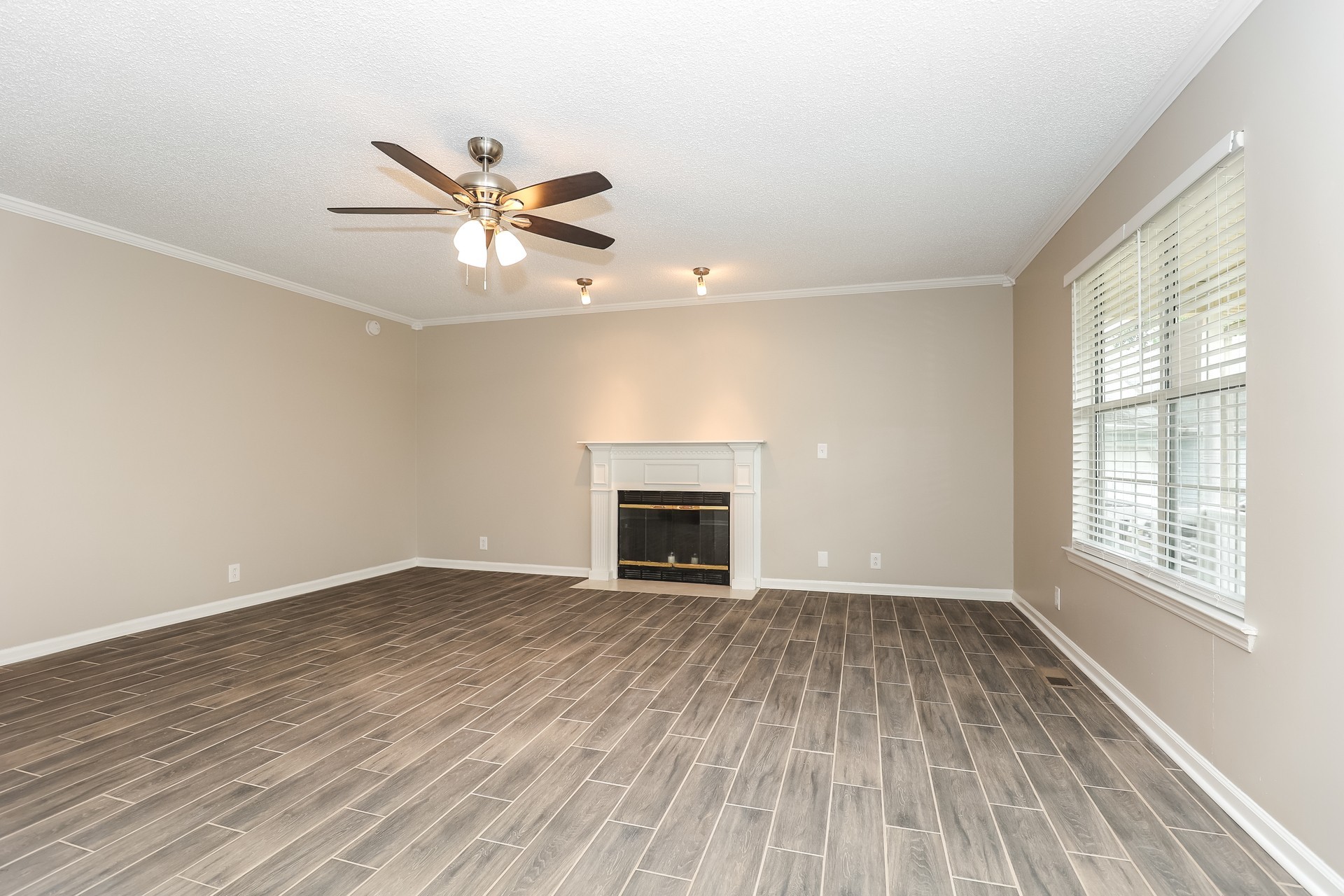 2503 Splinter Court Murfreesboro, TN 37130 - Photo 2 of 17 a view of an empty room with window and a fireplace