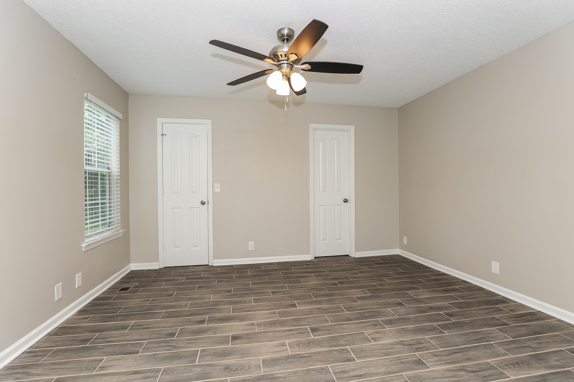2503 Splinter Court Murfreesboro, TN 37130 - Photo 9 of 17 a view of an empty room with wooden floor and a window