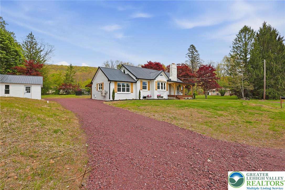 121 Ben Titus Road Tamaqua, PA 18252 - Photo 41 of 48 a view of a house with a yard