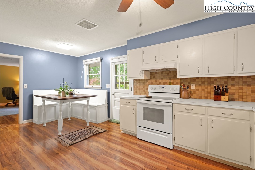 357 Kalmia Lane Boone, NC 28607 - Photo 13 of 41 a kitchen with a sink cabinets and window