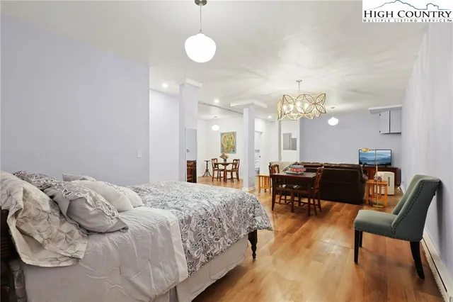 a bedroom with bed or furniture and a mirror