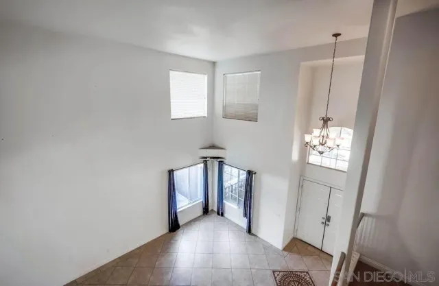 a view of a hallway with entryway