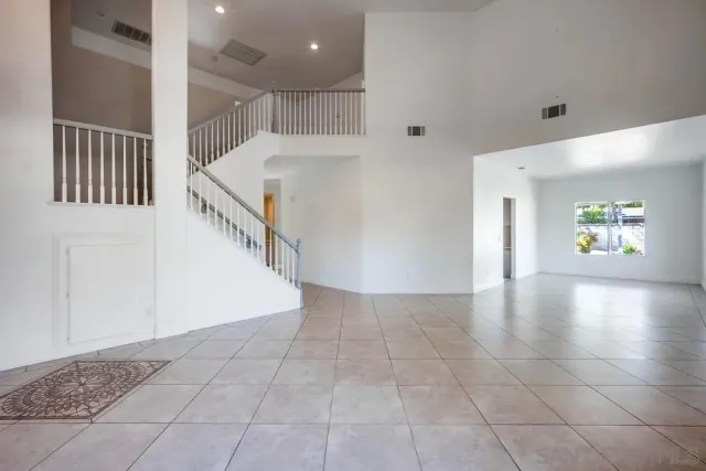 a view of an entryway with stairs