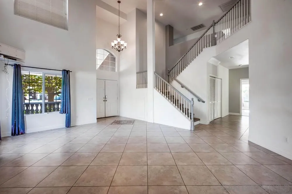 32789 Starlight Street Wildomar, CA 92595 - Photo 7 of 41 a view of entryway and hall with a living room