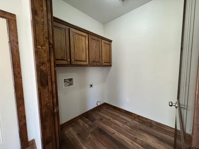 a bathroom with a tub and a sink