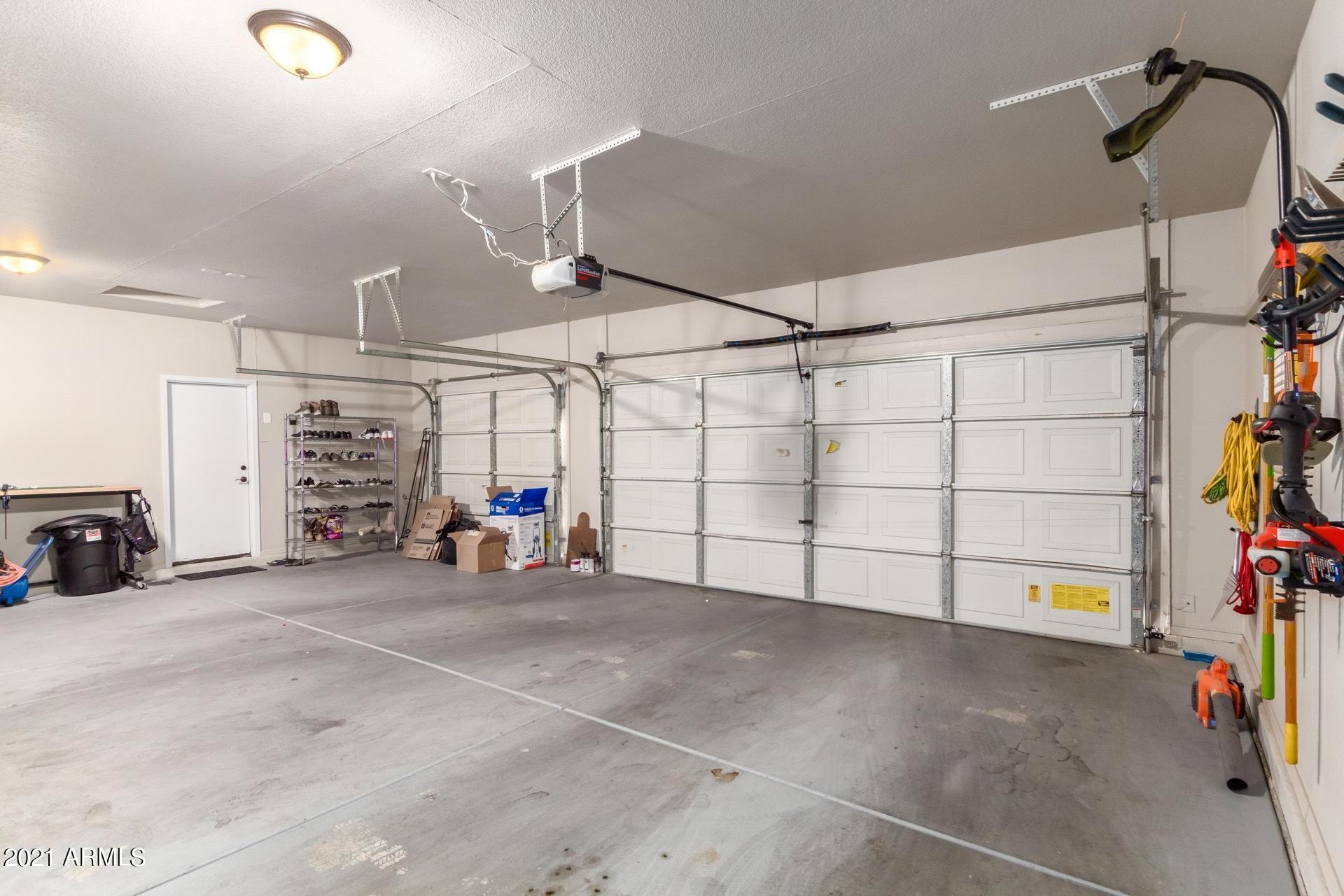 2107 West Carter Road Phoenix, AZ 85041 - Photo 15 of 19 3 car garage