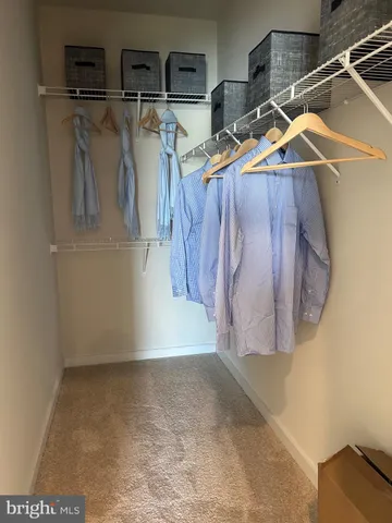 a bathroom with a toilet a sink and shower