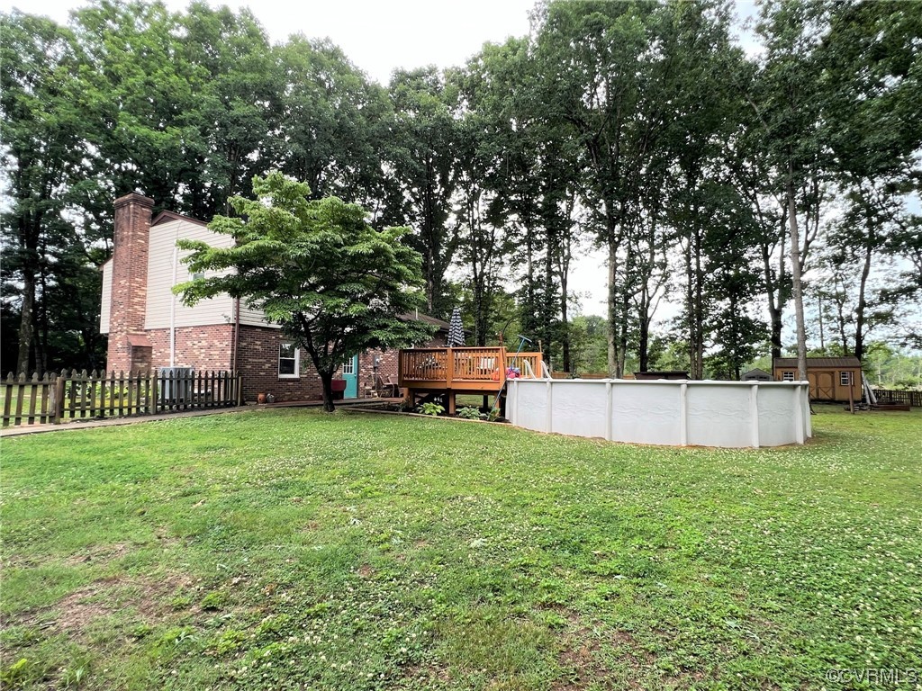4520 Cralles Road Amelia Court House, VA 23002 - Photo 19 of 21 a view of a garden and swimming pool