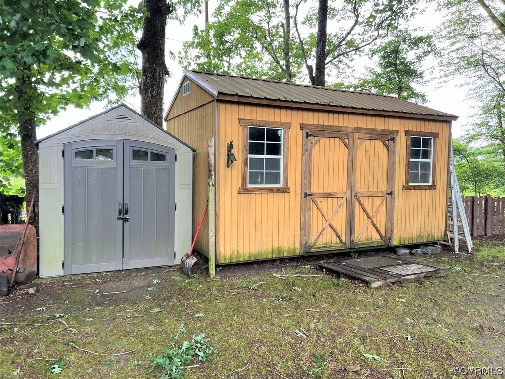 4520 Cralles Road Amelia Court House, VA 23002 - Photo 21 of 21 a view of a house with a small yard and a large tree