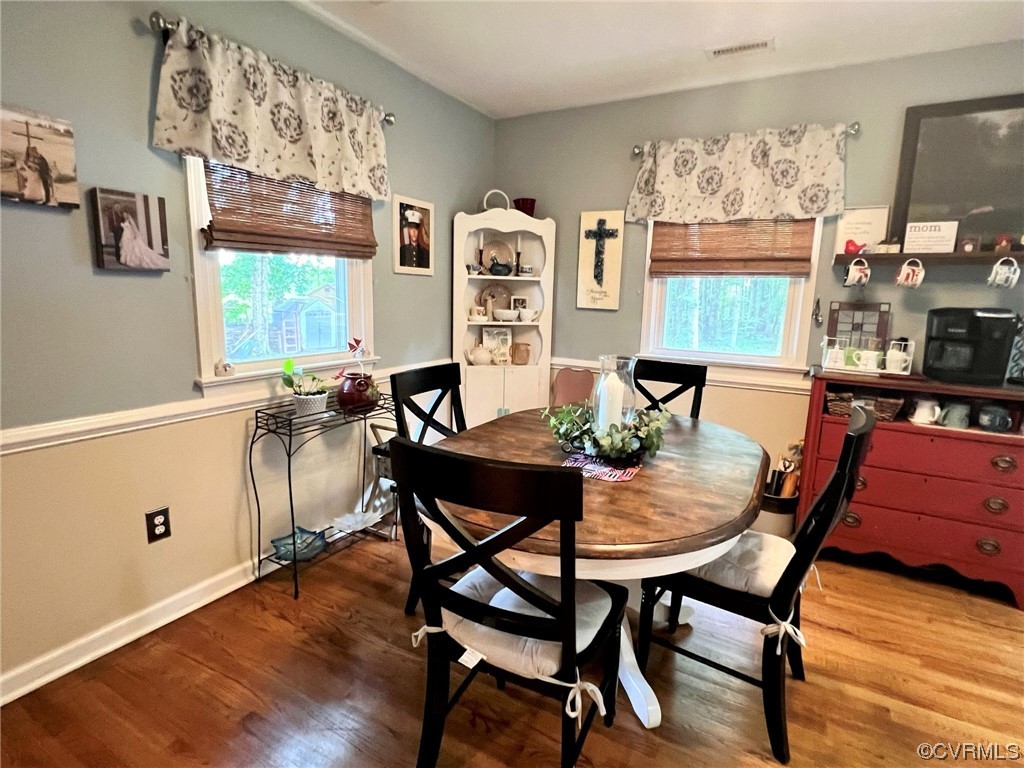 4520 Cralles Road Amelia Court House, VA 23002 - Photo 6 of 21 a view of a dining room with furniture window and wooden floor
