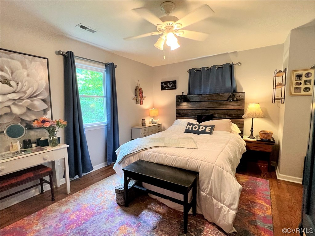 4520 Cralles Road Amelia Court House, VA 23002 - Photo 9 of 21 a bed room with a bed mirror and a window