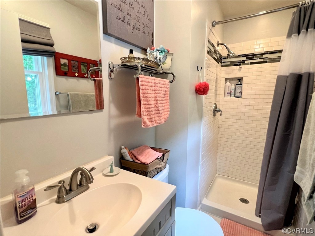4520 Cralles Road Amelia Court House, VA 23002 - Photo 10 of 21 a bathroom with a sink toilet and shower