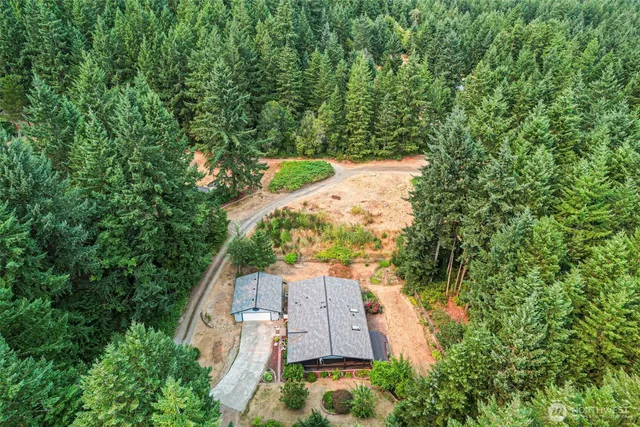 a view of a balcony with wooden floor