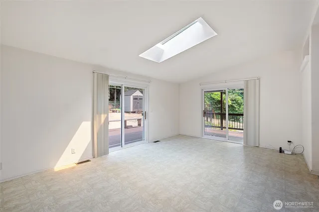 an empty room with windows