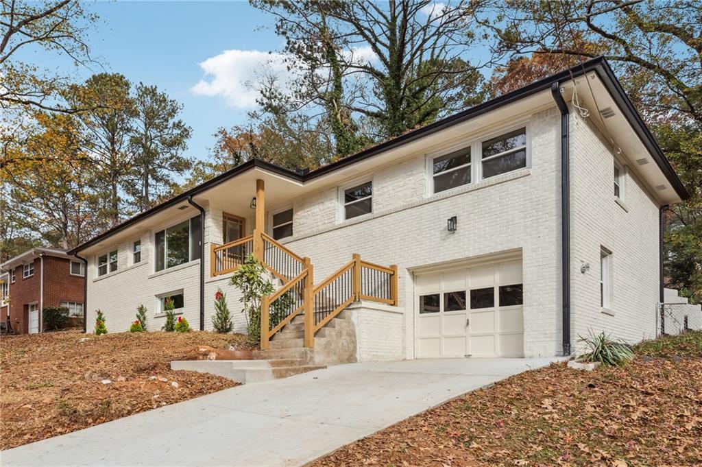 View of front facade featuring a garage