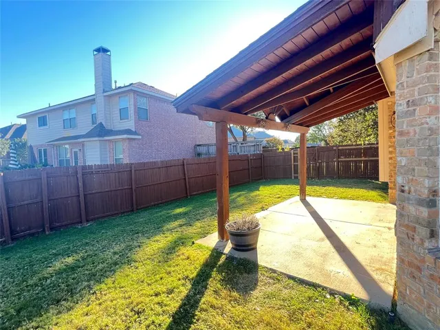 a view of yard with swimming pool