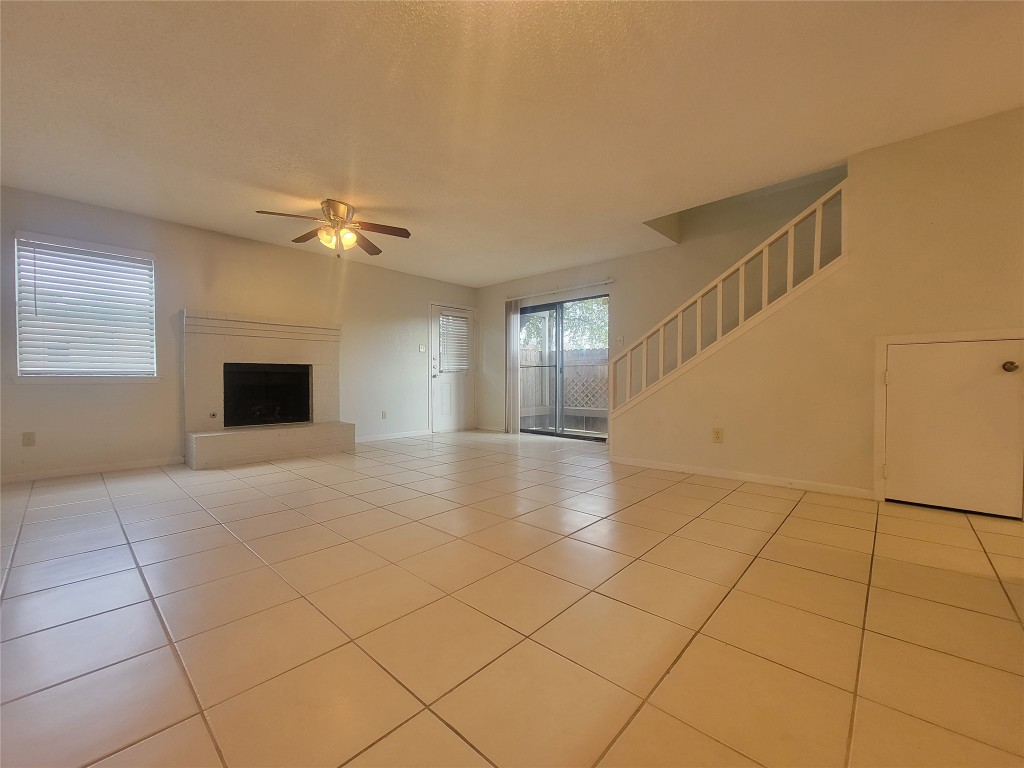 7825 Beauregard Circle, Unit 2A Austin, TX 78745 - Photo 14 of 27 a view of an empty room with glass door