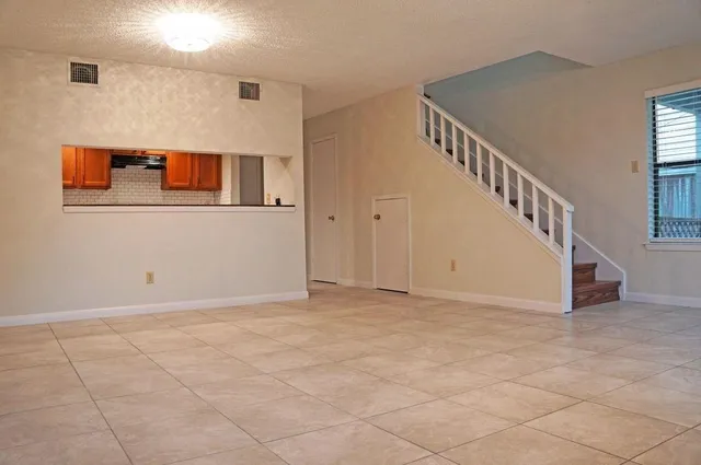 a view of an entryway with staircase