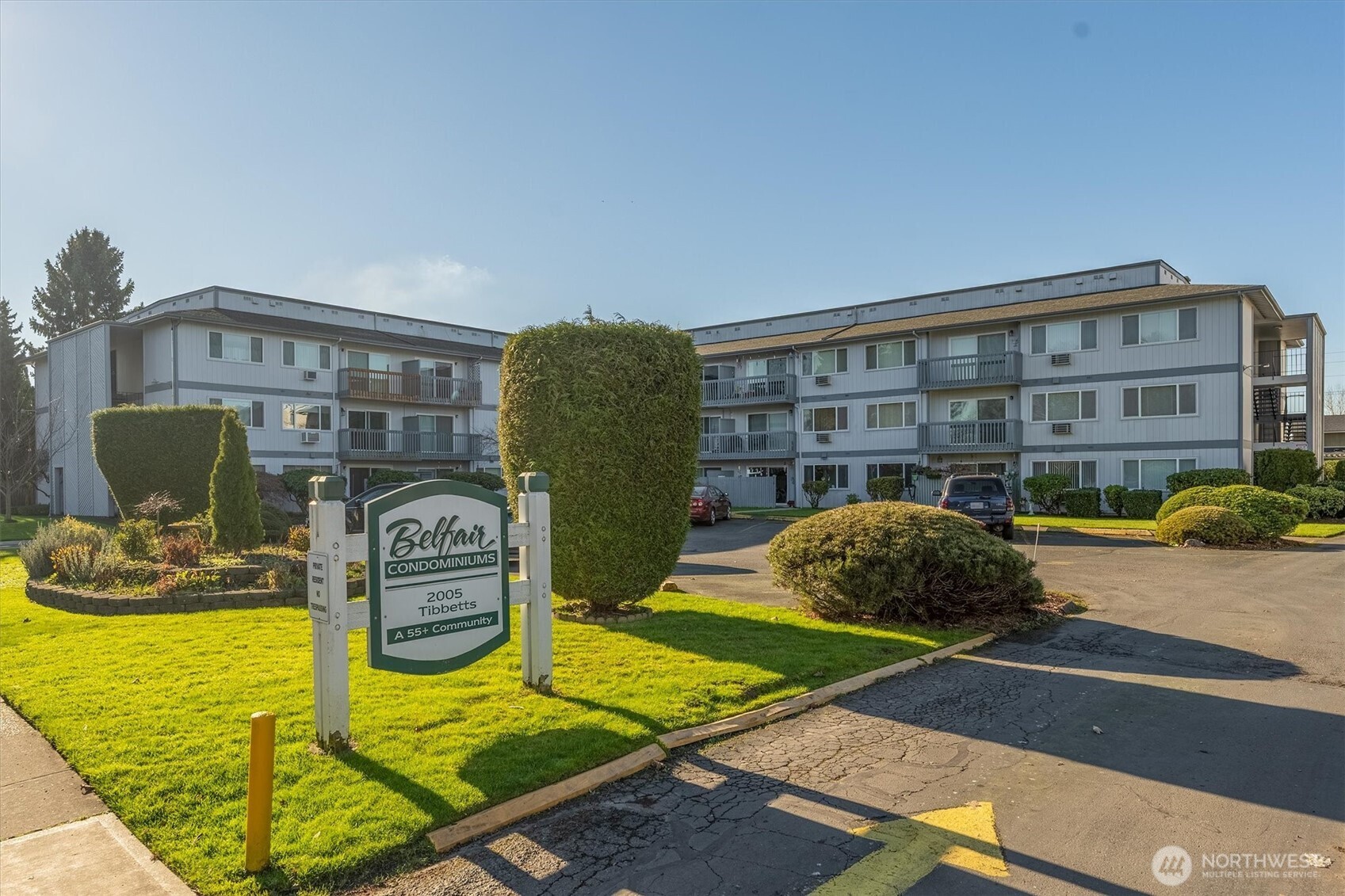 a view of a balcony with table and chairs
