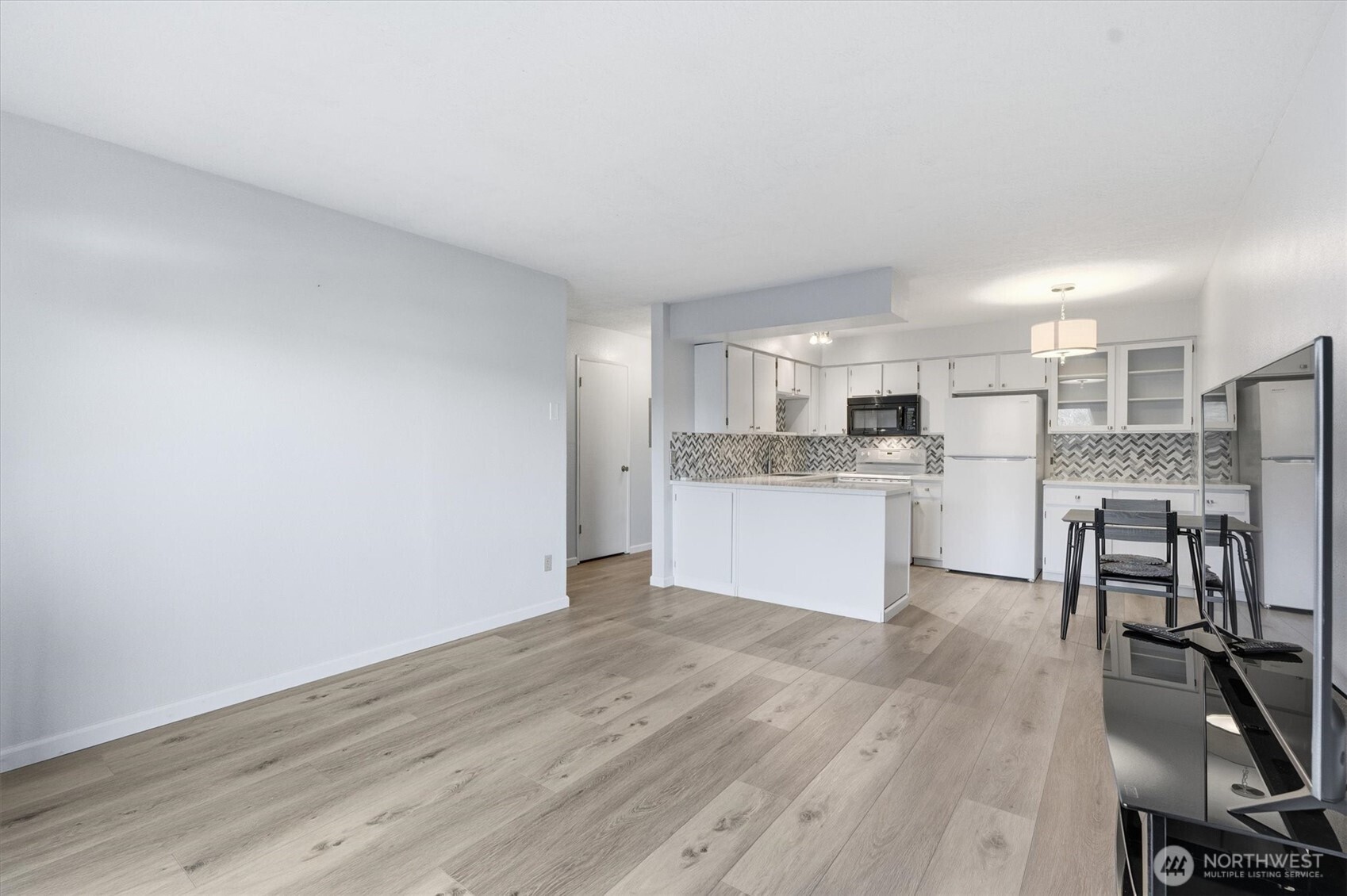 2005 Tibbetts Drive, Unit 209 Longview, WA 98632 - Photo 14 of 40 a view of kitchen with wooden floor