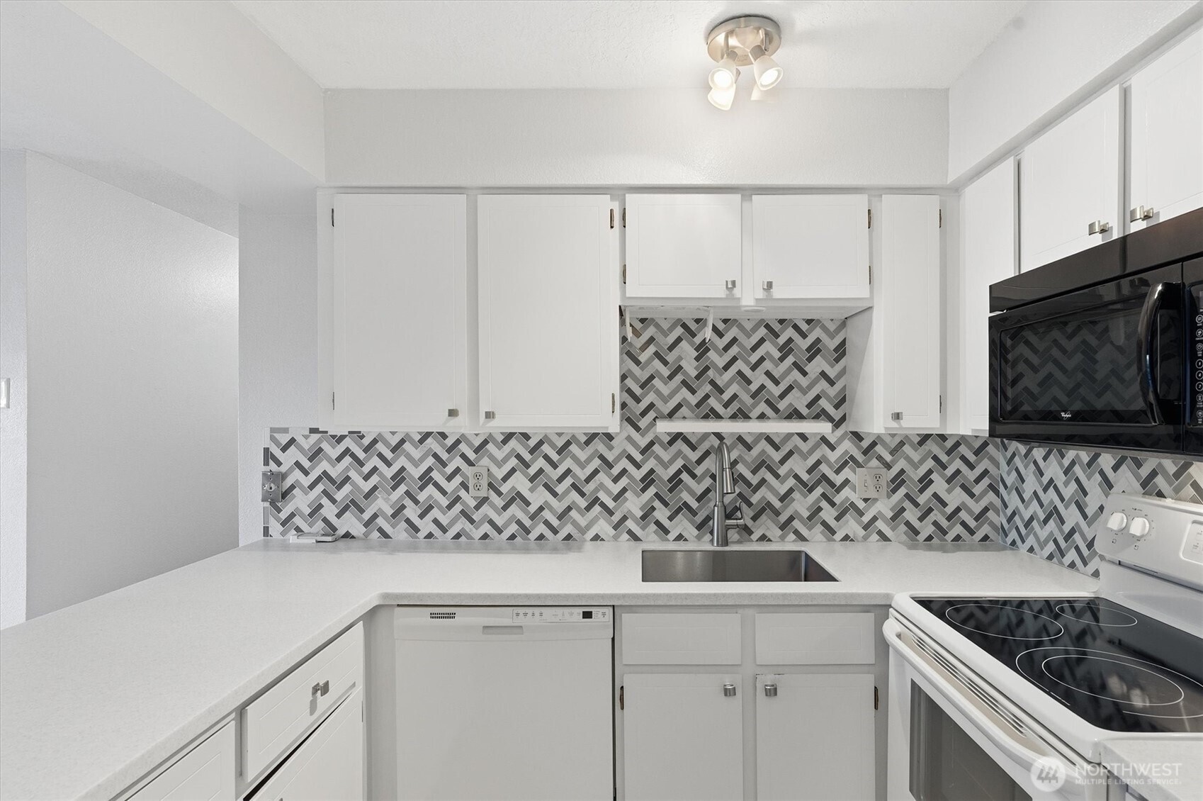 2005 Tibbetts Drive, Unit 209 Longview, WA 98632 - Photo 21 of 40 a kitchen with a sink and cabinets