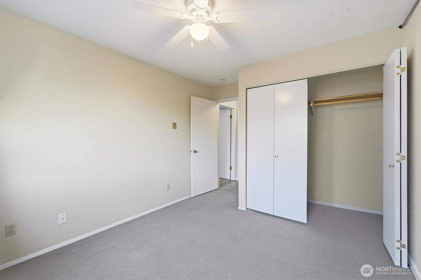 2005 Tibbetts Drive, Unit 209 Longview, WA 98632 - Photo 27 of 40 a view of an empty room and chandelier fan