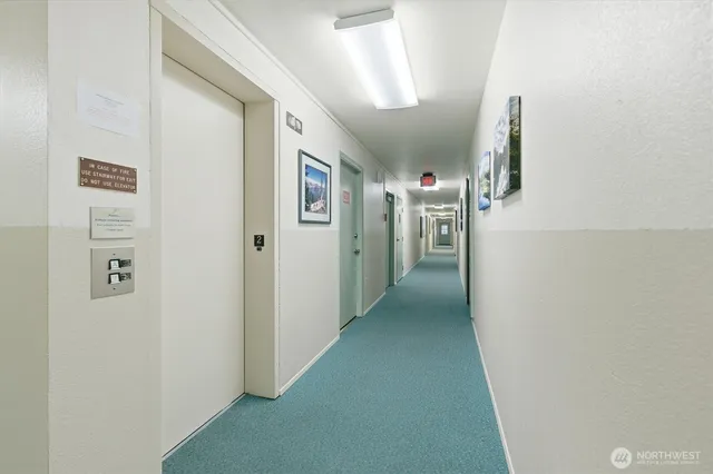 a view of a hallway with closet