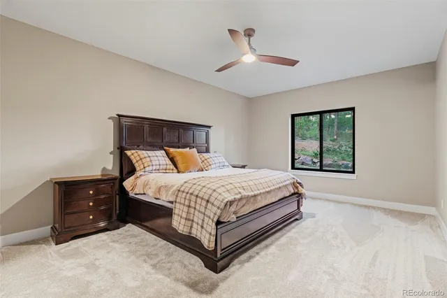 a view of a patio with table and chairs and wooden floor